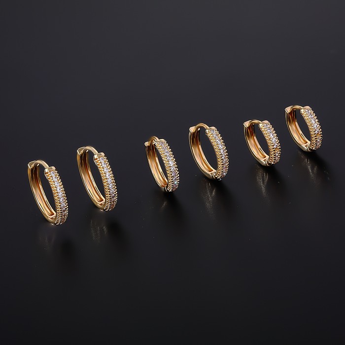 Ensemble de bijoux plaqué or et Zircon, 3 paires de cercles doux, incrustation de cuivre et de Zircon