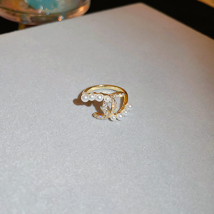 Estilo moderno estilo simples flor geométrica cobre pérolas artificiais zircão anel aberto a granel