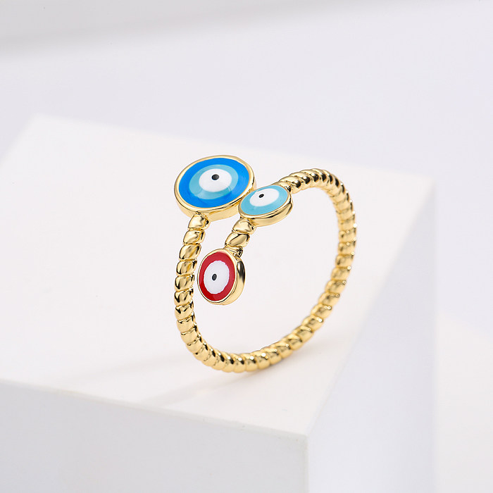 Art- und Weisekupferner Überzug-realer Goldtropfen-Öl-Augen-geometrischer offener Ring
