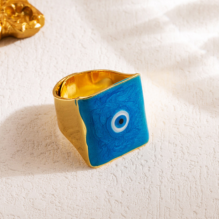 Künstlerischer offener Ring mit Teufelsauge-Kupfer-Emaille und 18-Karat-Vergoldung