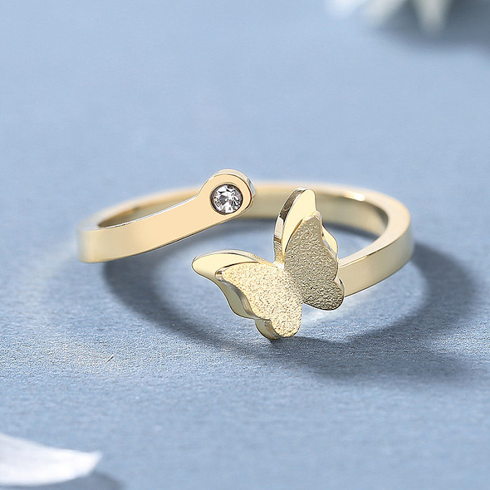 Estilo simples borboleta titânio aço polimento chapeamento incrustação pedras preciosas artificiais 18k anel aberto banhado a ouro
