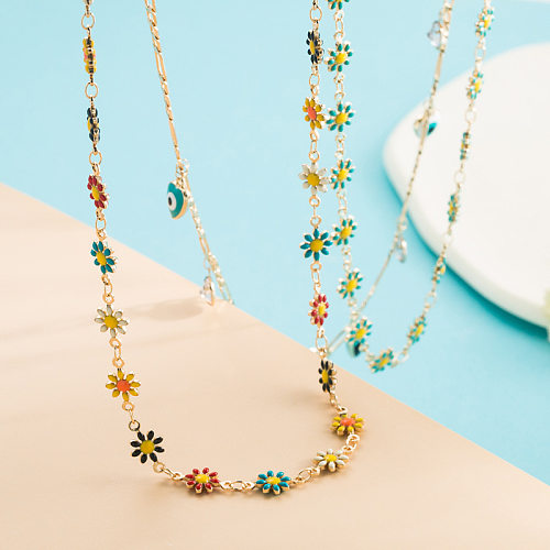 Halskette mit kleinen Gänseblümchen-Öltropfen aus Kupfer im böhmischen Stil, vergoldet und mit Mikroeinlagen aus Zirkon