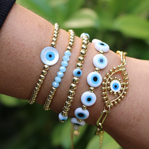 Bracelet multicouche de perles dorées, couleur ethnique simple, glaçure colorée, mauvais œil