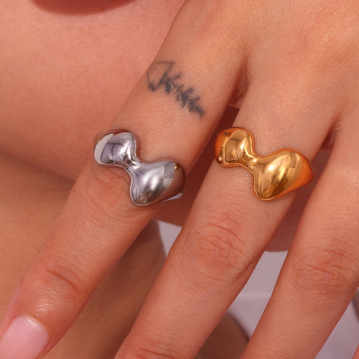 Neuartiger, schlichter, geometrischer, offener Ring aus Edelstahl mit 18-Karat-Vergoldung