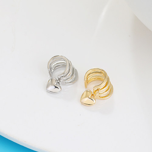 1 peça estilo simples comute coração forma chapeamento oco cobre clipes de orelha banhados a ouro