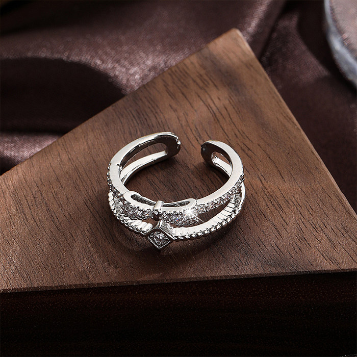 Nœud papillon brillant en cuivre et métal, incrustation ajourée en Zircon, anneaux ouverts