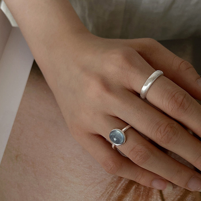 Offener Ring im IG-Stil mit geometrischer Verkupferung und Inlay aus künstlichen Edelsteinen