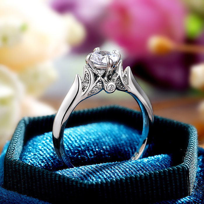 Modischer OL-Engagement-Klassiker-Ring aus glänzendem Zirkon-Kupfer mit vier Krallen