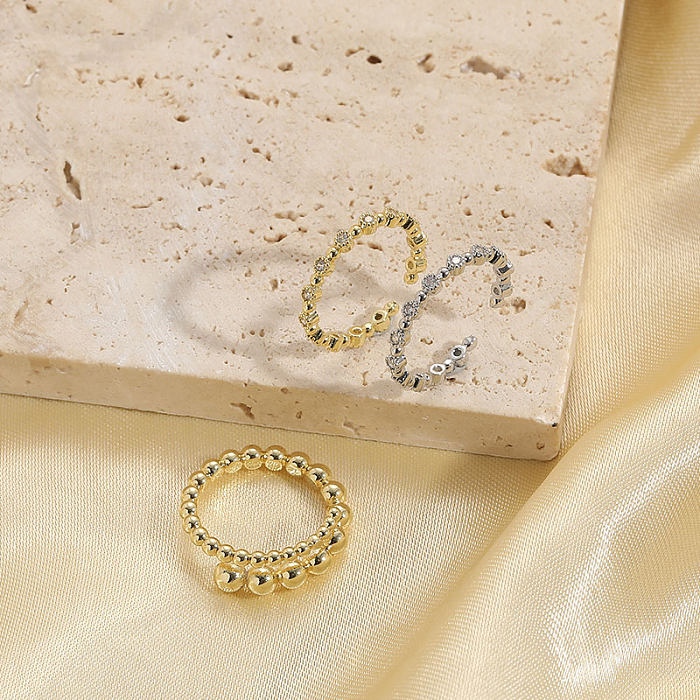 Eleganter, einfarbiger, 14-karätig vergoldeter Zirkon-Ring aus Kupfer in großen Mengen