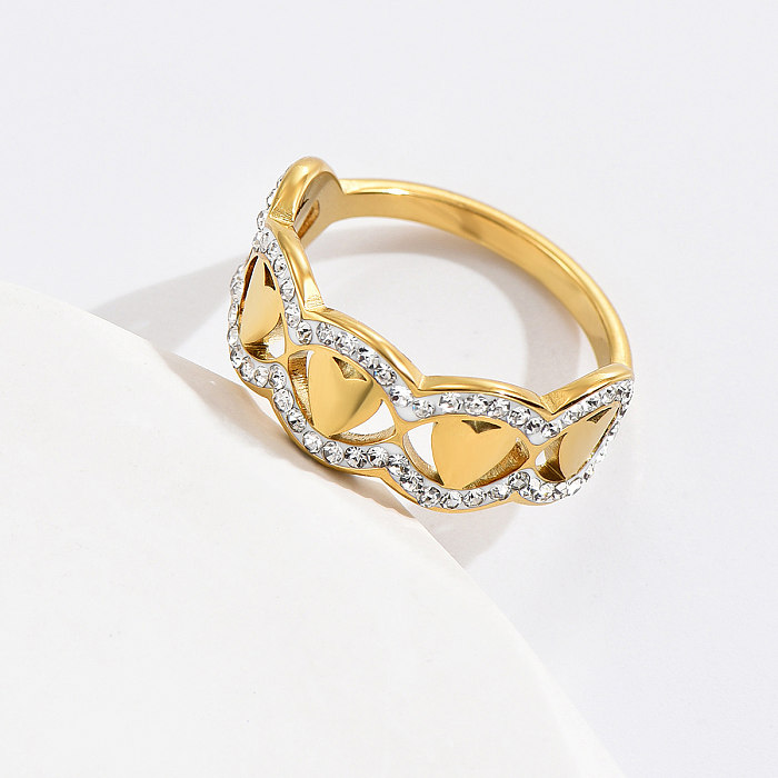 Venta al por mayor de anillos de diamantes de imitación artificiales chapados en plata chapados en oro de 14K de acero inoxidable con forma de corazón Retro