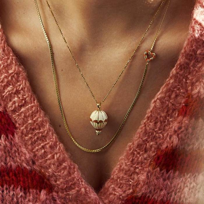 Elegante estilo clássico formato de coração em aço inoxidável cobre banhado a ouro 18K colar com pingente a granel