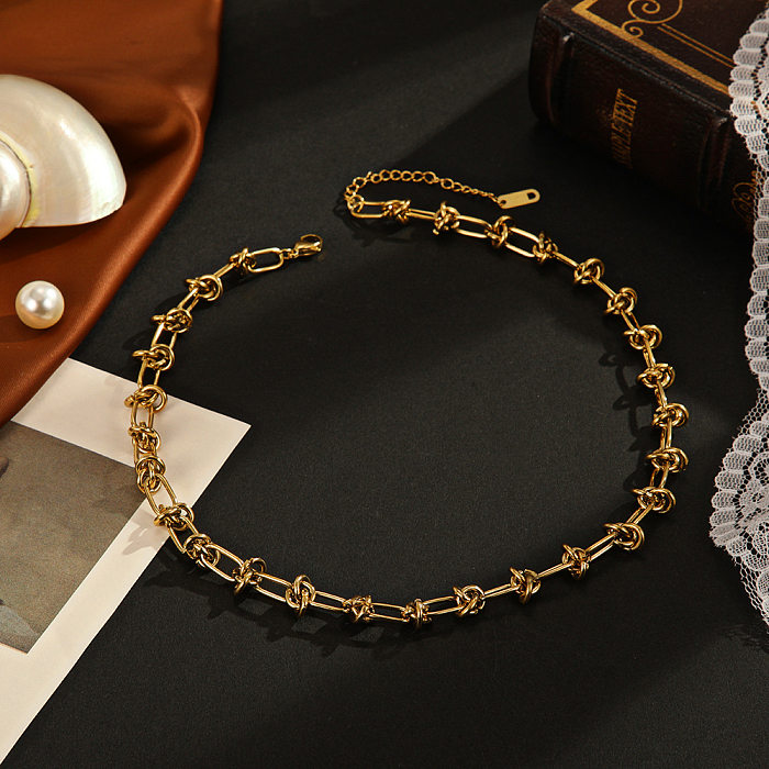 Collier de bracelets en acier titane rond trèfle à quatre feuilles de style simple rétro