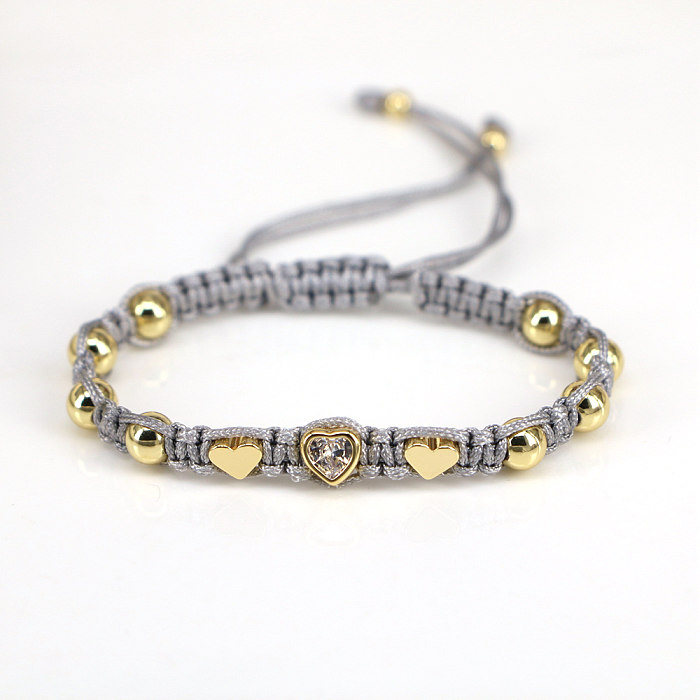 Elegante herzförmige Seil-Kupfer-vergoldete Zirkon-Armbänder, 1 Stück