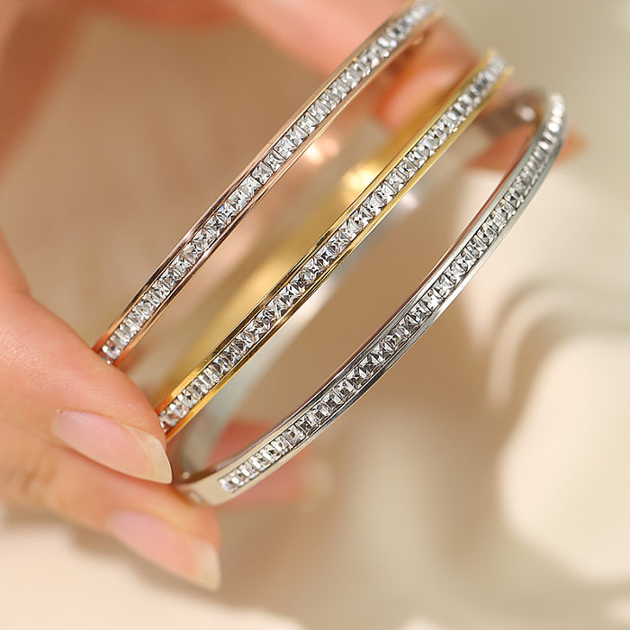 Pulseras de anillos de diamantes de imitación con incrustaciones de acero de titanio de color sólido de estilo simple