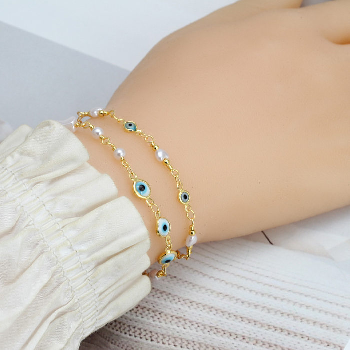 1 pièce de bracelets plaqués cuivre avec perles d'imitation d'oeil de style simple