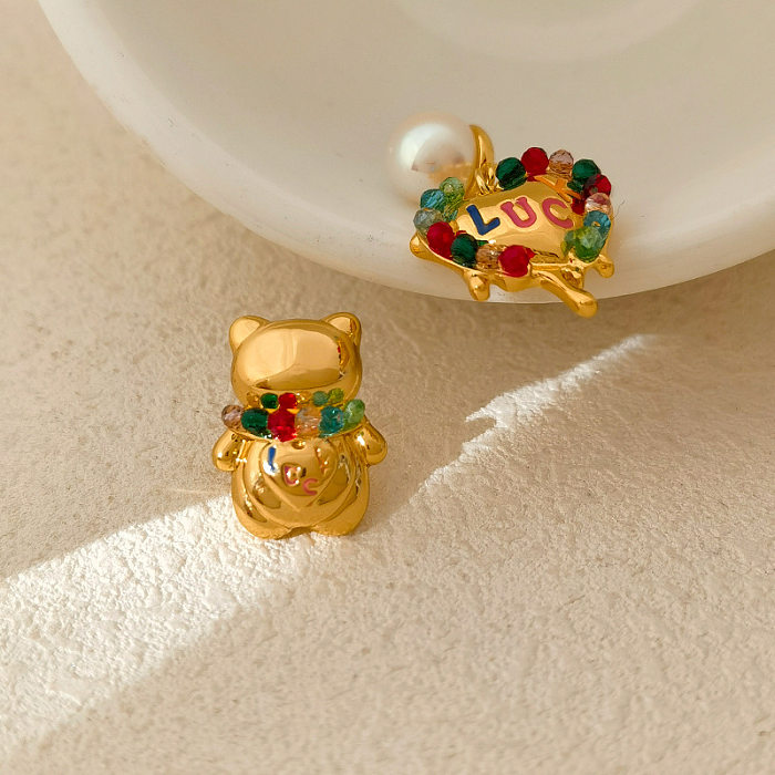 1 Paar modische Bären-Ohrringe mit Kupfer-Inlay und Strasssteinen