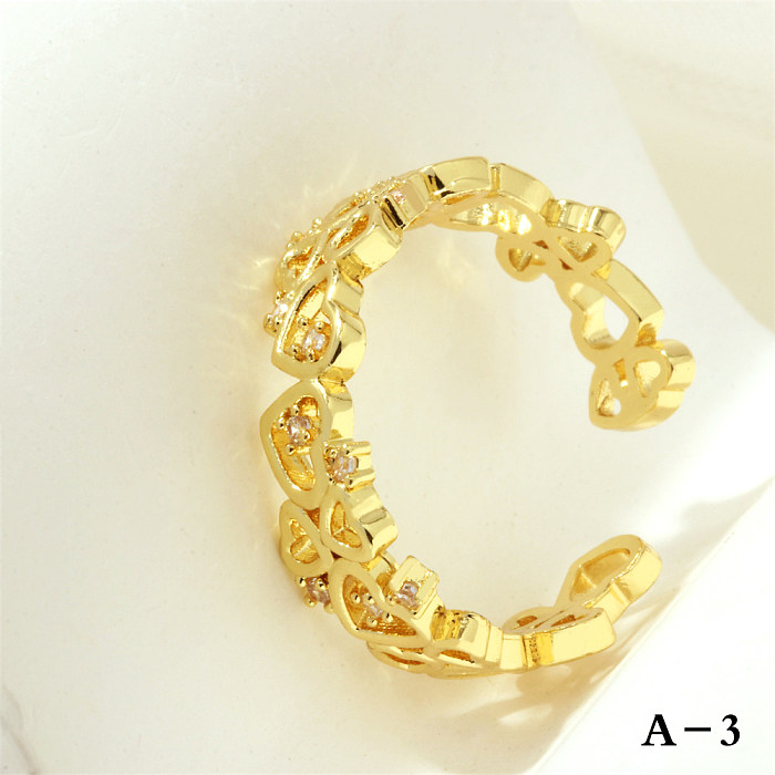 Luxuriöse offene Ringe in Buchstaben-Herzform mit Kupferbeschichtung und Zirkoneinlage, 18 Karat vergoldet