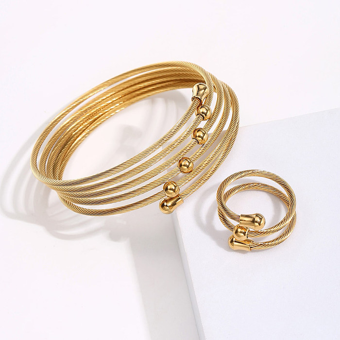 Bracelets à anneaux plaqués en acier à rayures spirales à la mode, 1 ensemble