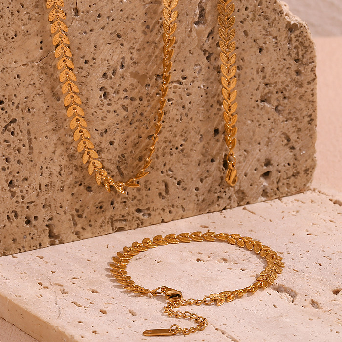 Collar chapado en oro de 18 quilates con revestimiento de acero inoxidable de grano de estilo simple