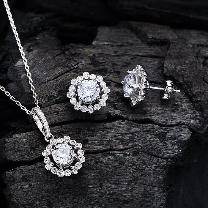 Conjunto de joyería con collar y pendientes de diamantes con alto contenido de carbono con incrustaciones de cobre y flores elegantes