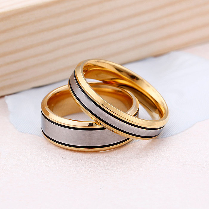 Fornecimento de fábrica transfronteiriço vendido fonte de jóias fabricante casal anéis de titânio aço moda sala anel de ouro presente qixi