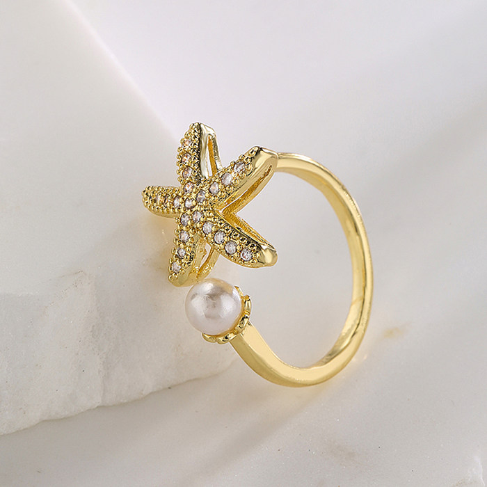 Modischer offener Ring mit Blatt-Seestern-Schmetterling, Kupfer, vergoldet, Perle und Zirkon