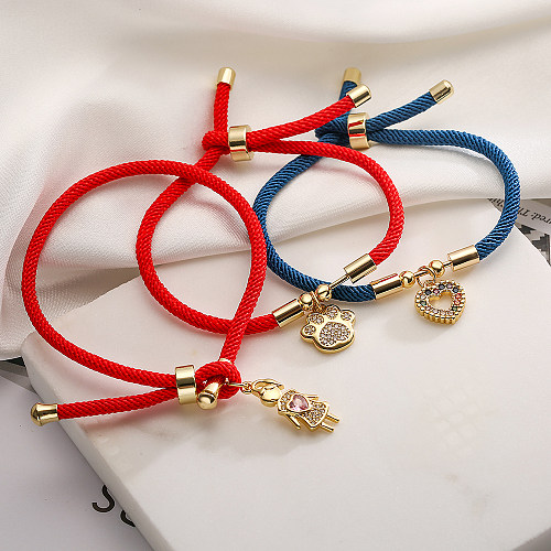 Bracelets plaqués or 18K de zircon d'incrustation de placage de cuivre de forme de coeur de trajet de style simple