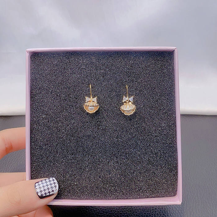 1 Pair Simple Style Bow Knot Shell Plating Inlay Copper Artificial Pearls Zircon Ear Hook