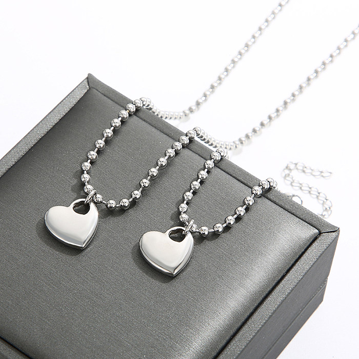 Süße herzförmige Halskette mit Perlenarmbändern aus Edelstahl