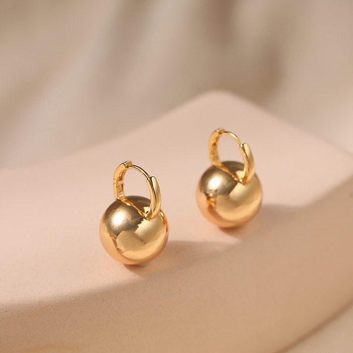 1 paire de boucles d'oreilles rondes en cuivre plaqué or 18 carats, Style IG Simple, couleur unie