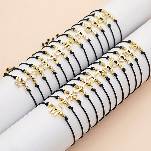 Handgefertigte Armbänder mit Buchstaben-Kupfer-Perlenbeschichtung