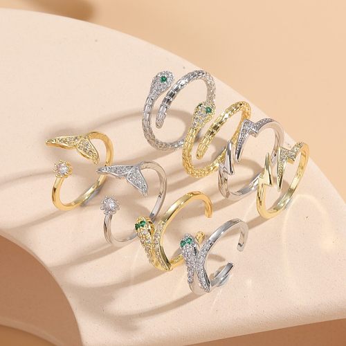 Eleganter offener Ring mit Schlangen- und Blitz-Fischschwanz-Verkupferung, Inlay aus Zirkon und 14-karätigem Gold