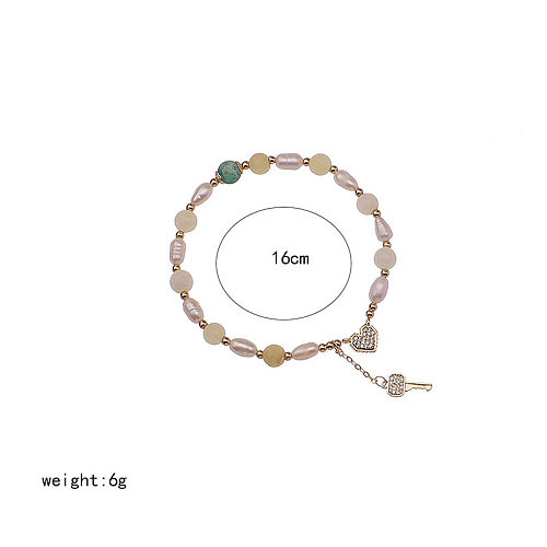 Simple Style Commute Heart Shape Key Freshwater Pearl Copper Beaded Inlay Zircon Bracelets
