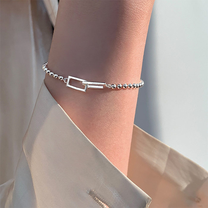 Bracelets plaqués cuivre géométriques de style IG