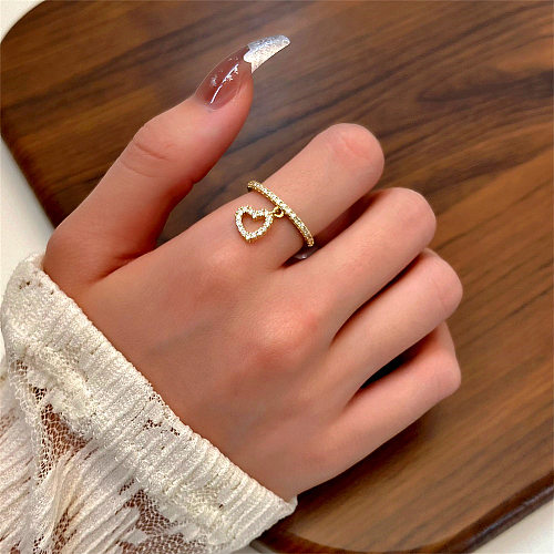 Incrustaciones de anillos de diamantes de imitación de cobre con corazón a la moda para mujer