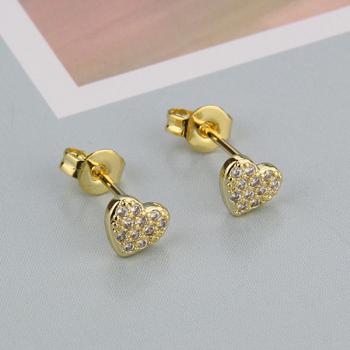 Mode nouvelles boucles d'oreilles en cuivre plaqué or en forme de coeur