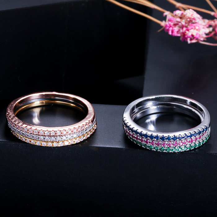 Ringe im klassischen Stil mit geometrischer Verkupferung und Inlay aus Zirkon, 14 Karat vergoldet, vergoldet und rhodiniert