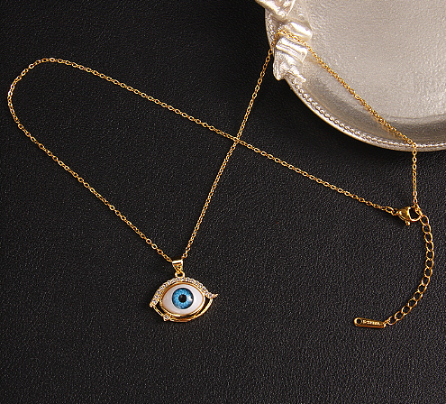 Streetwear Devil'S Eye Heart Shape Titanium Steel Copper Zircon Pendant Necklace In Bulk