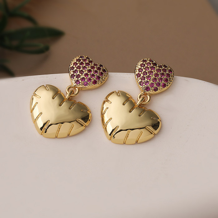 1 Paar schlichte Pendel-Ohrringe in Herzform mit Inlay aus Kupfer und Zirkon mit 18-Karat-Vergoldung