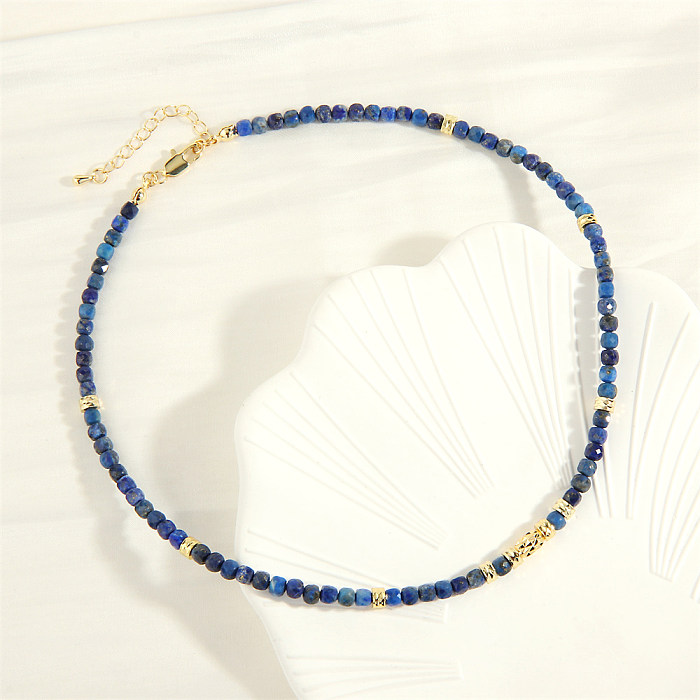 Strand-Halskette mit runden künstlichen Edelsteinen, Kupfer, 18 Karat vergoldet, in großen Mengen