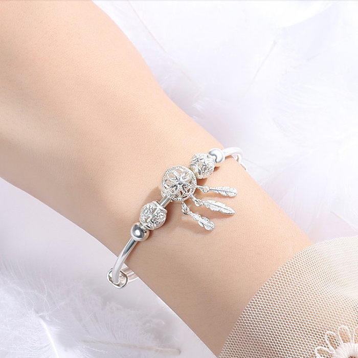Retro Fashion Bow Knot Copper Tassel Hollow Out Bangle