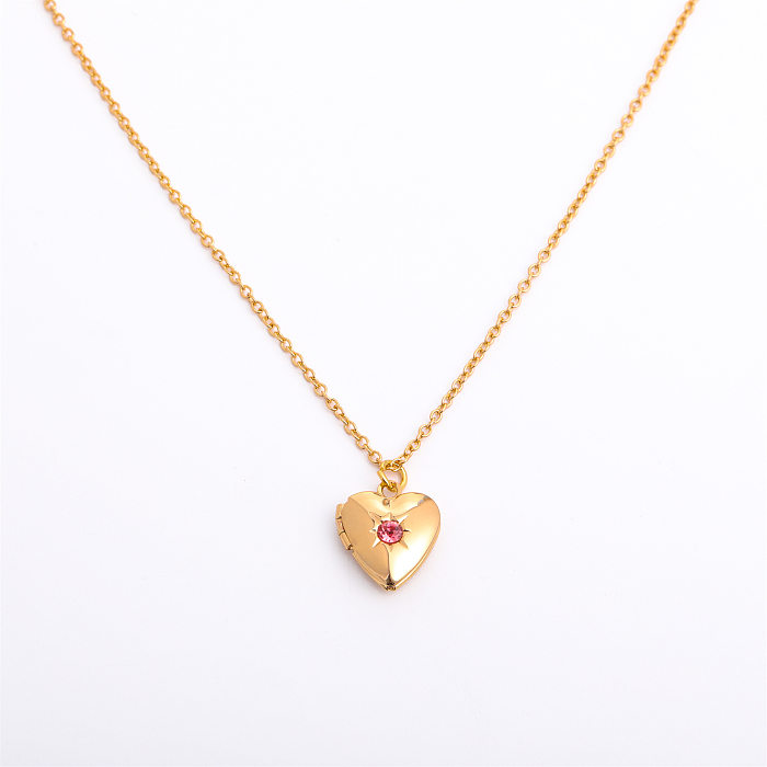Collier pendentif rétro en forme de cœur en acier titane et cuivre avec incrustation de pierre de naissance plaquée or 14 carats