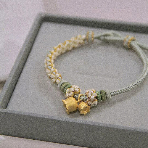 Bracelets plaqués or de placage de cuivre de fleur de style simple