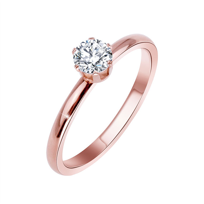 Venta al por mayor de anillos de circón chapados en oro rosa con incrustaciones de revestimiento de acero de titanio de acero inoxidable de color sólido informal al por mayor