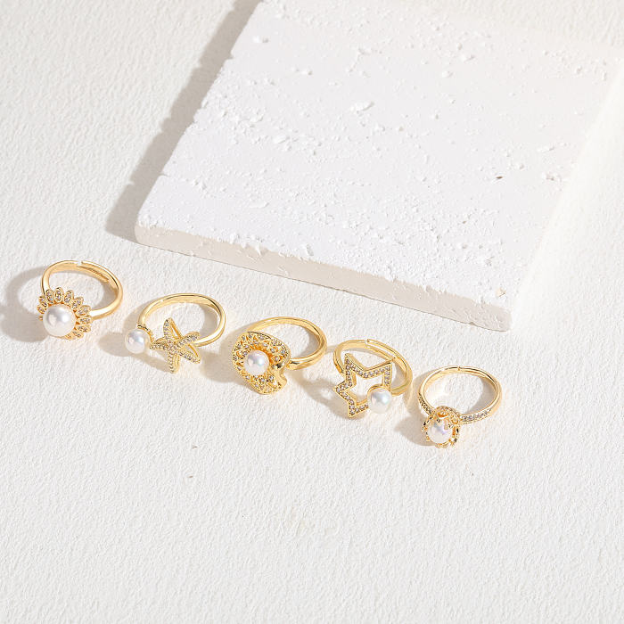 Eleganter, luxuriöser, klassischer offener Stern-Kupfer-Inlay-Zirkon-Ring mit 14-Karat-Vergoldung