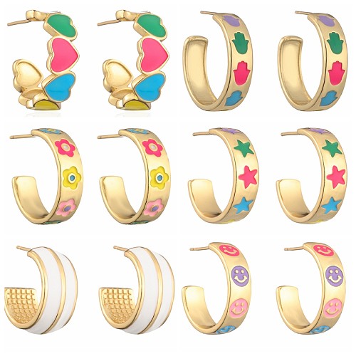 1 Paar elegante, herzförmige, emaillierte, kupfervergoldete Ohrringe