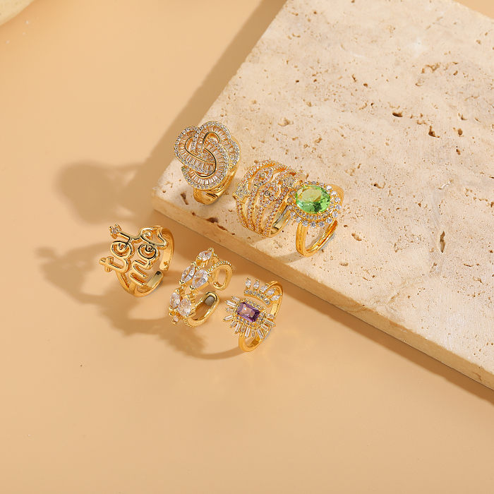 Elegante, luxuriöse, ovale, 14 Karat vergoldete, offene Ringe mit Teufelsaugen-Stern-Motiv und Inlay aus Glaszirkon