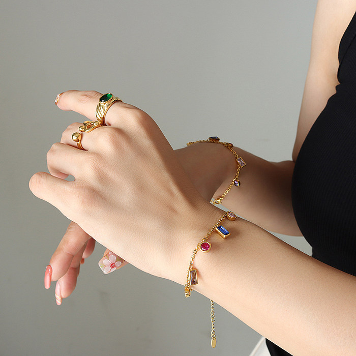 Schlichter Stil mit geometrischem Titanstahl, vergoldeter Zirkon-Armband-Halskette