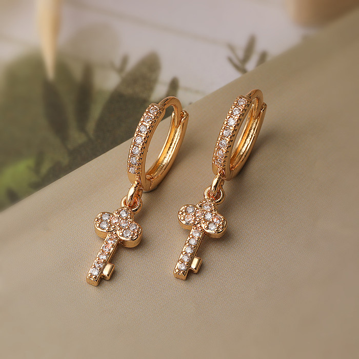 1 paire de boucles d'oreilles pendantes plaquées or 18 carats, Style Simple, incrustation de placage croisé en cuivre et Zircon