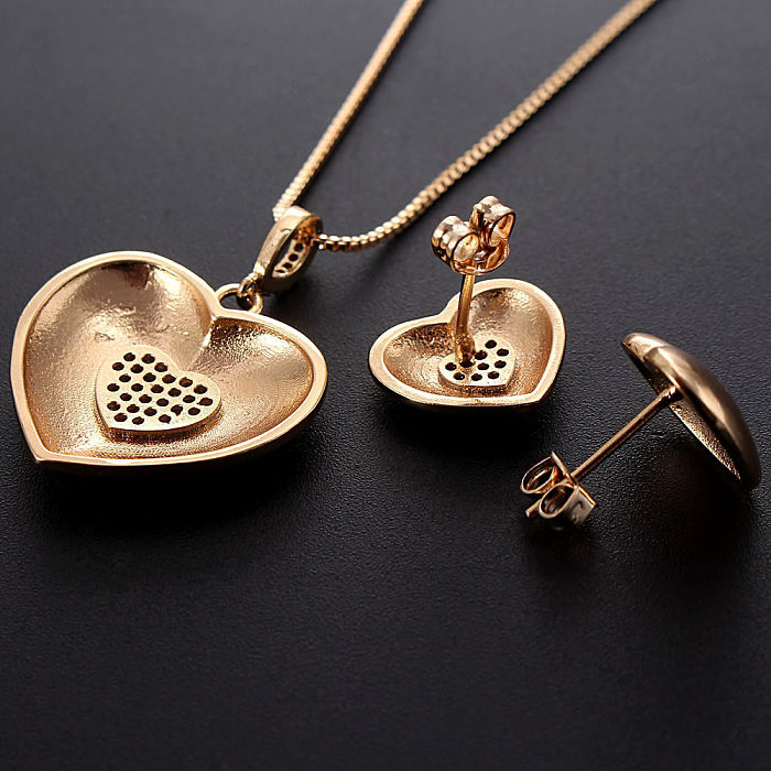مجموعة مجوهرات أساسية مطلية بالنحاس على شكل قلب ومرصعة بالزركون ومطلية بالذهب